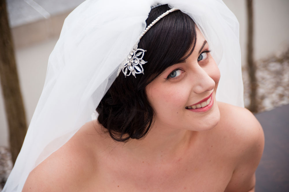 Bride smiling up at camera
