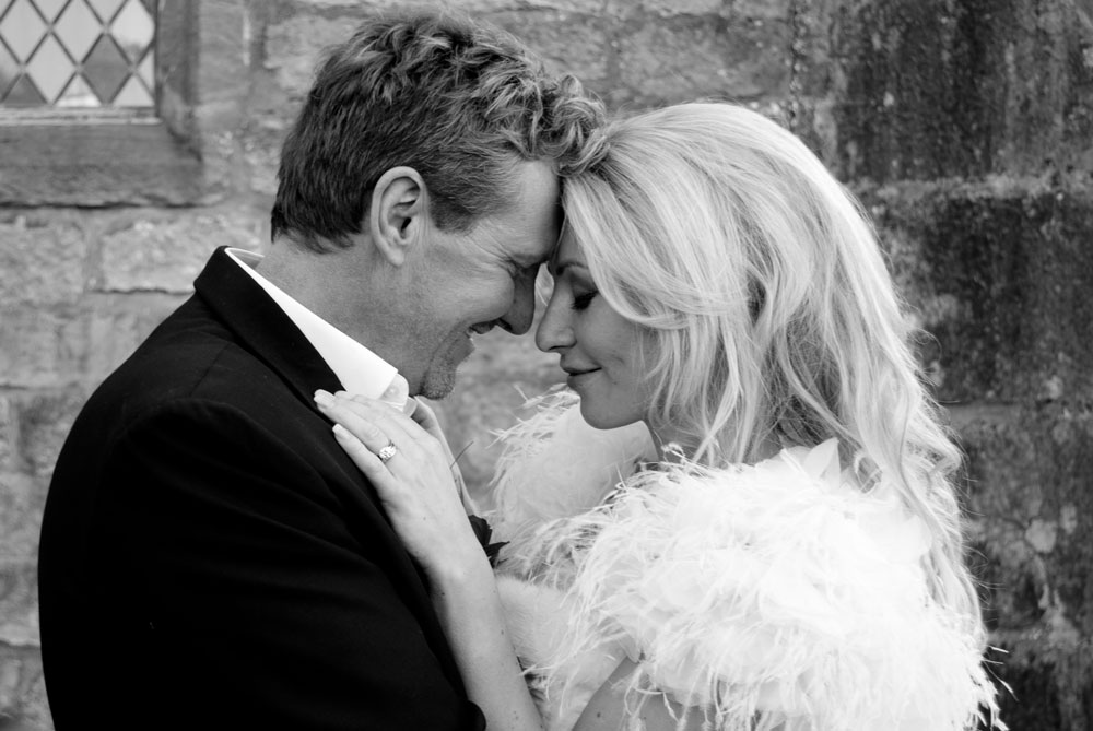 Couple hugging with eyes closed