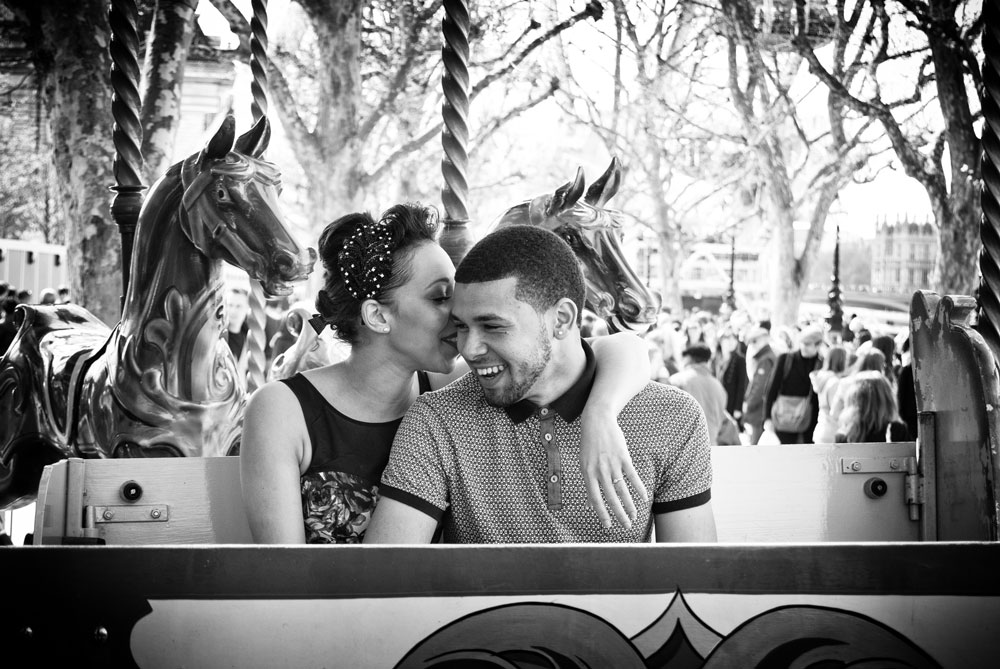 Couple talking on carousel