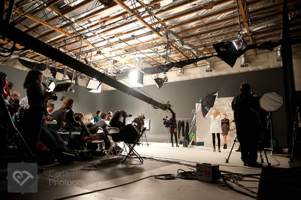 Wide angle view of the studio while Lara Jade shoots