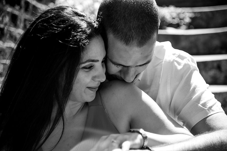 Engaged couple on steps
