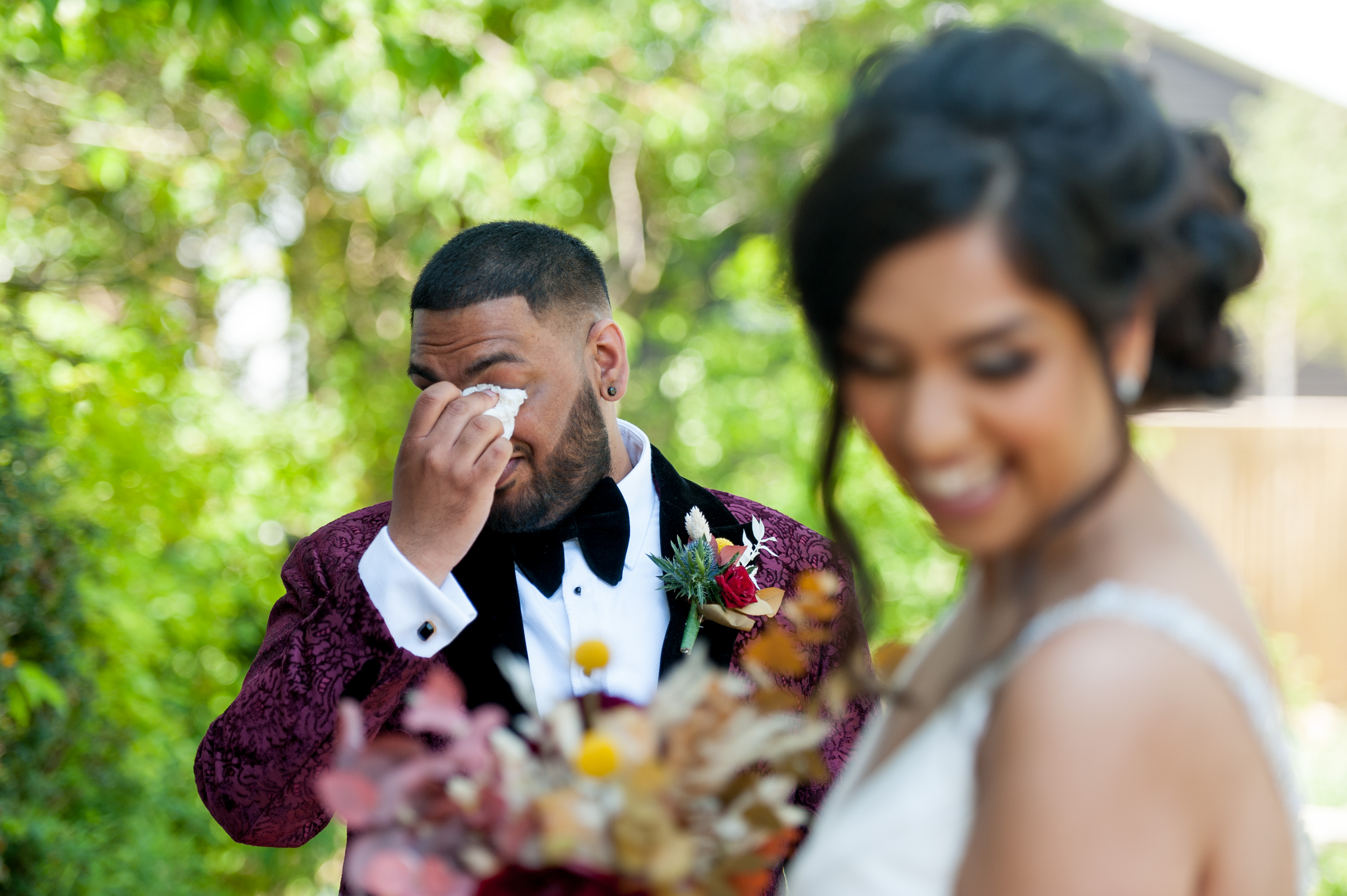 Groom crying at the altar
