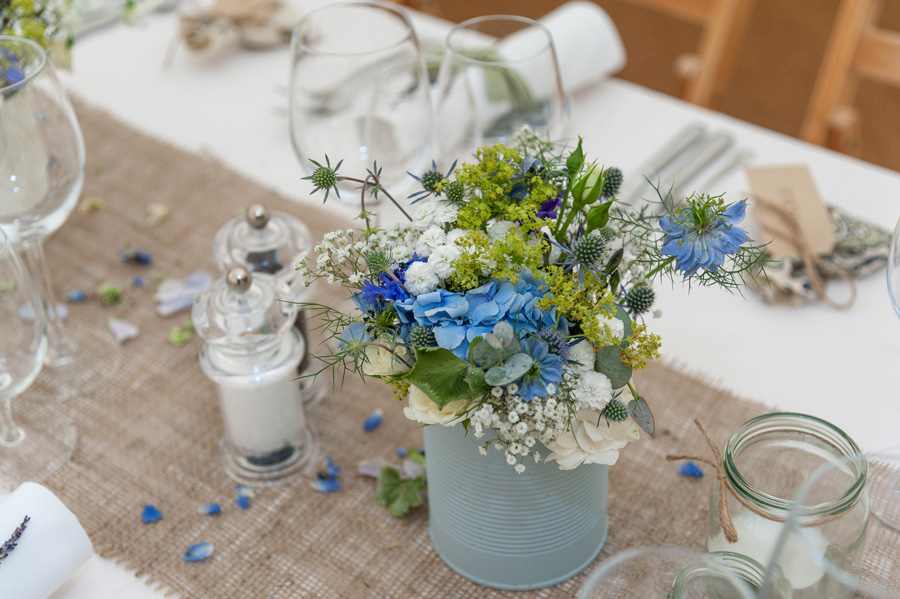 Flower centrepieces in recycled cans