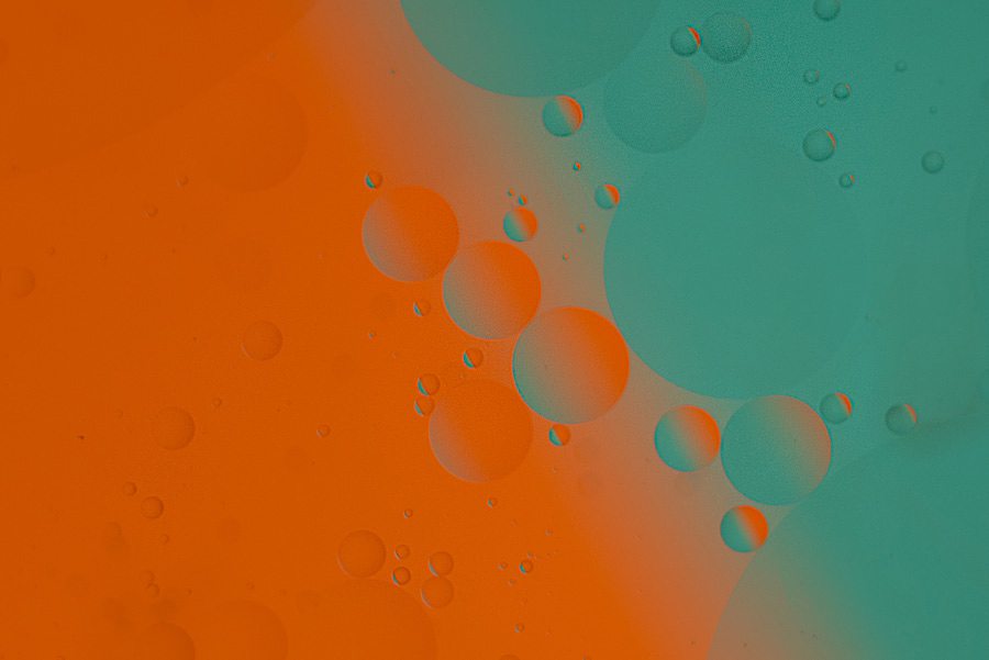 Oil and water photo with orange and green background