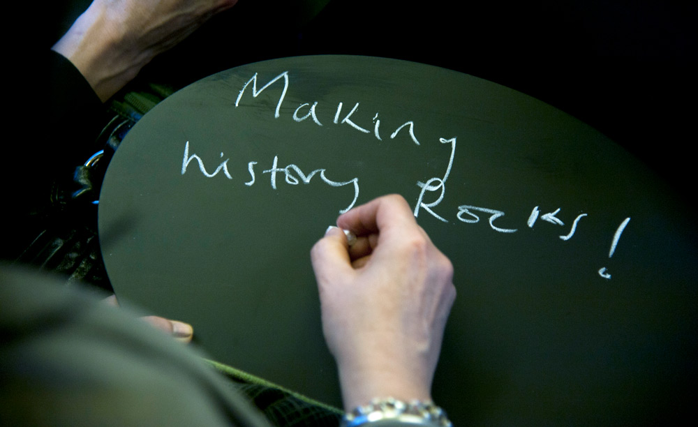 Chalk board with making history rocks guest message