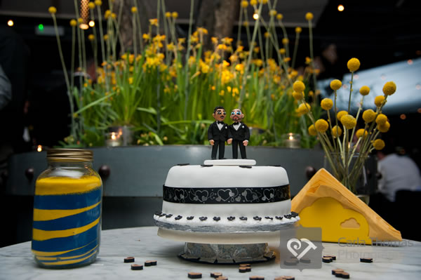 Wedding cake with groom and groom cake toppers
