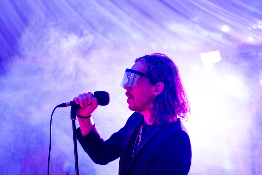 Evening wedding entertainment with dramatic lighting