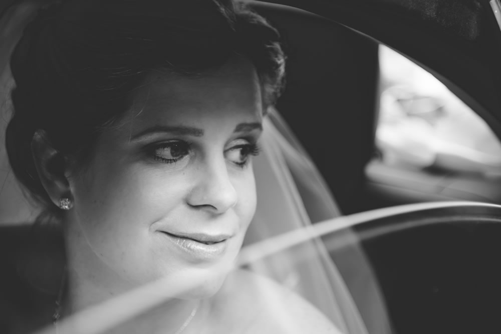 Bride looking out of car window