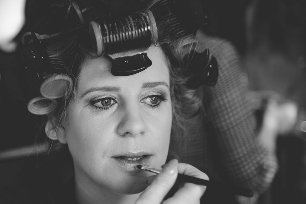 Bride getting make up done