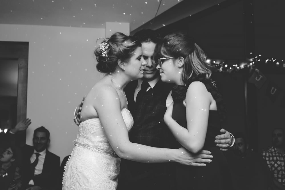 Couple with daughter on dancefloor