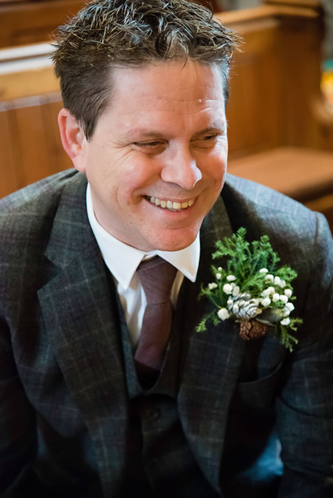 Groom laughing