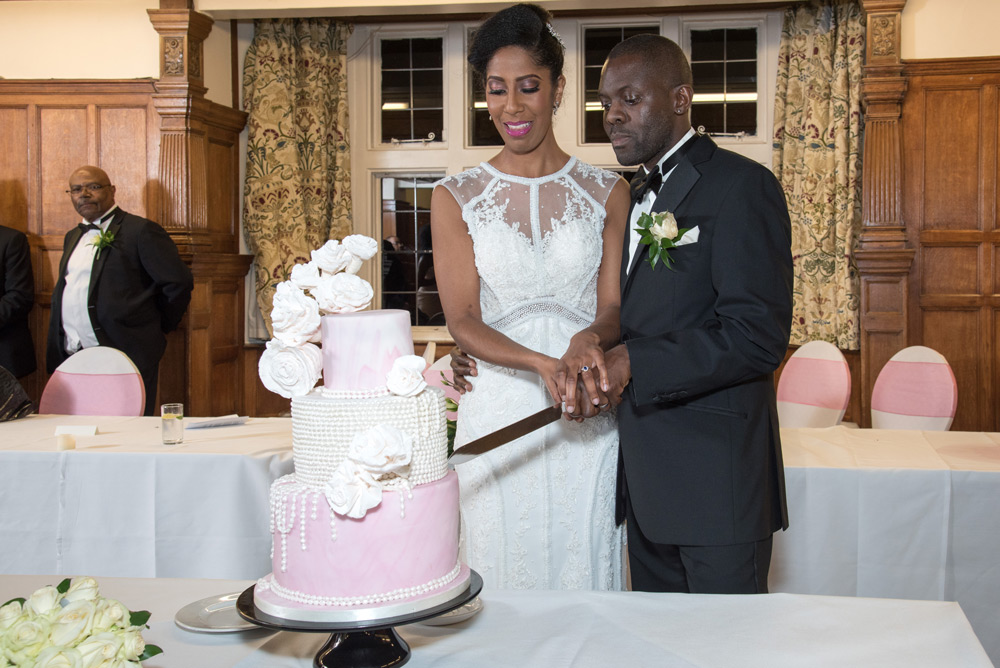 Couple cutting the wedding cake
