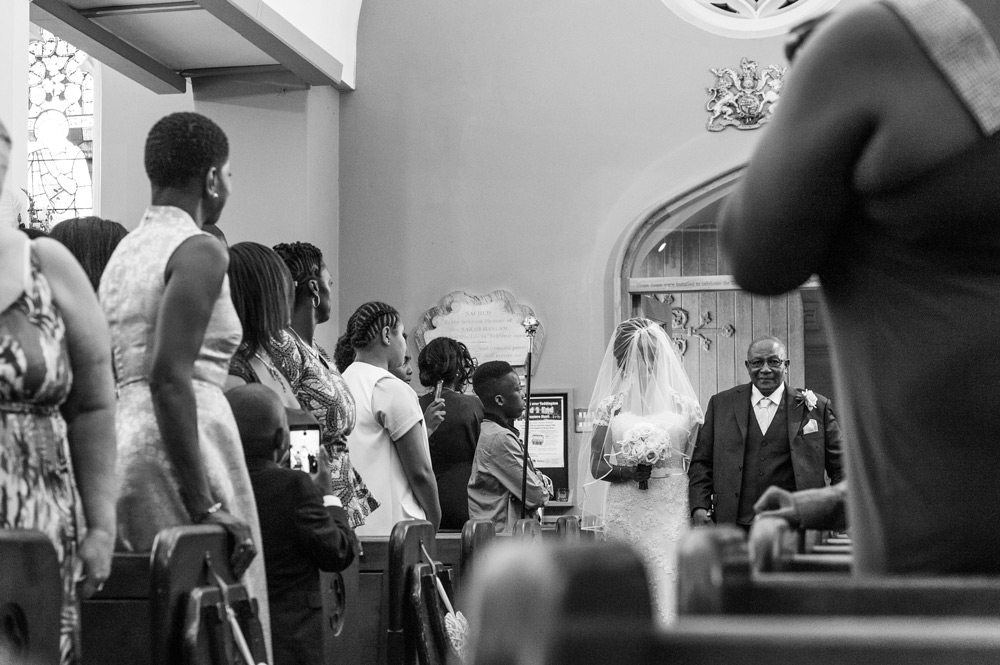 Bride walking down the aisle with her father
