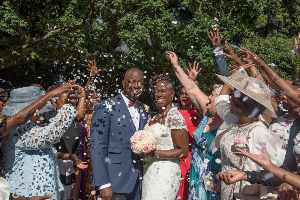 Confetti thrown over bride and groom
