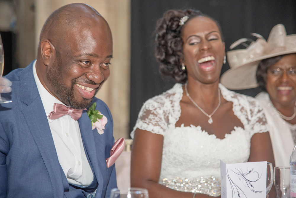 Couple laughing at speeches