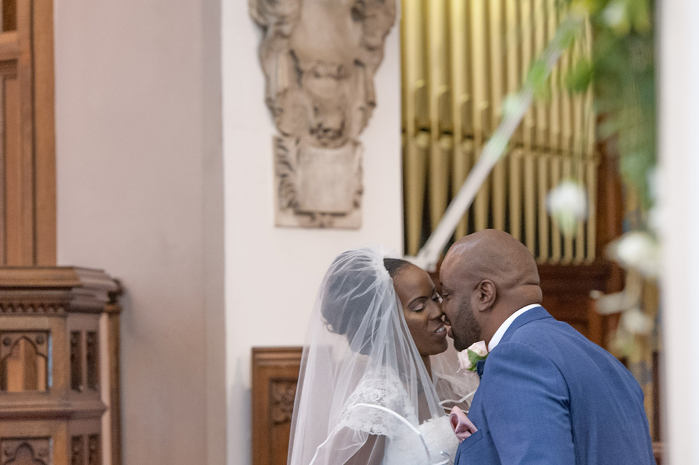 Bride and groom&rsquo;s first kiss