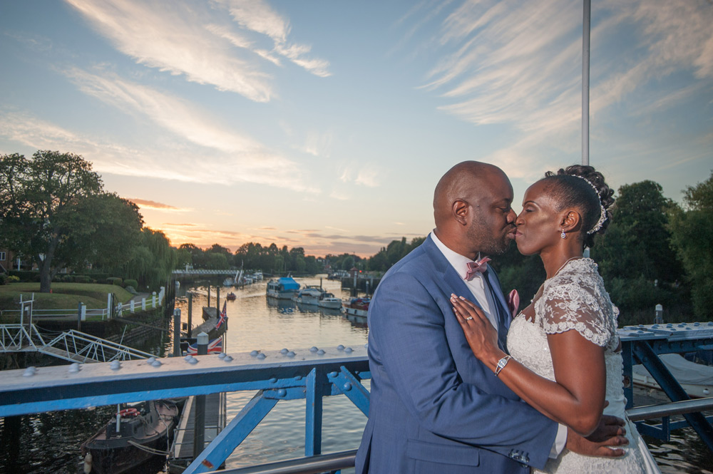 Couple kissing on the bridge