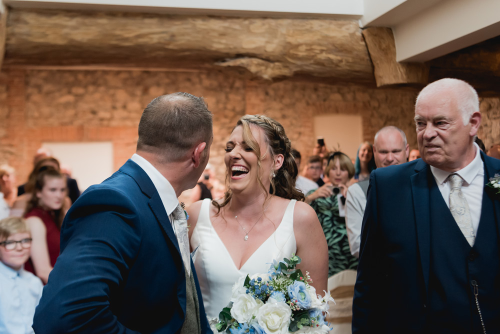 Bride and groom stood at the altar
