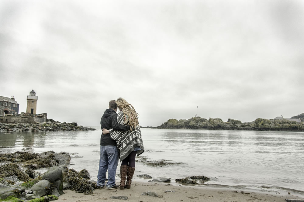 Couple looking out to sea