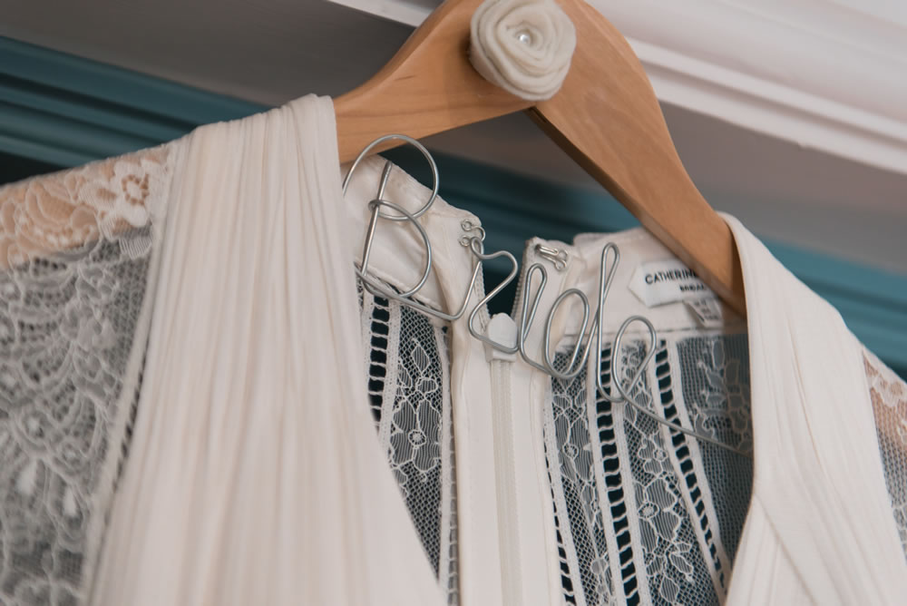 Bride hanger with wedding dress
