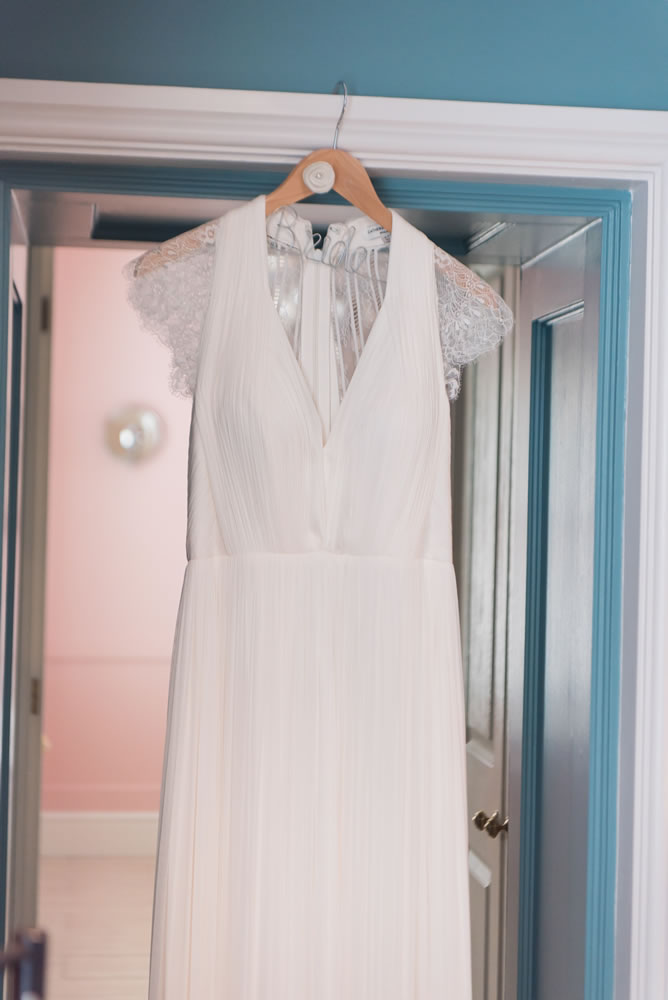 Catherine Deane wedding dress on hanger