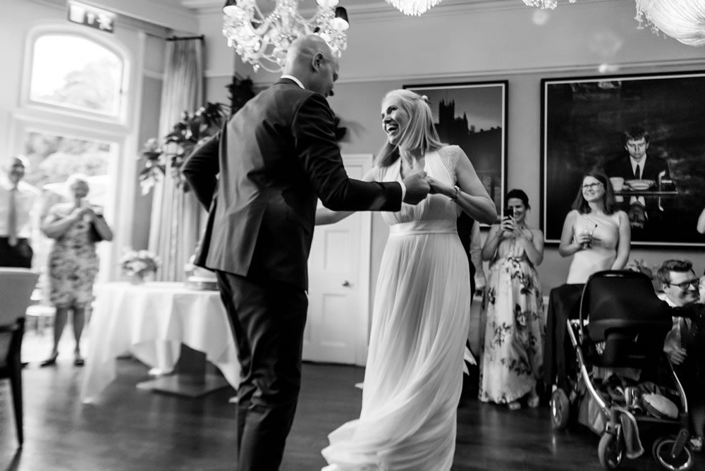 Couple laughing during their first dance