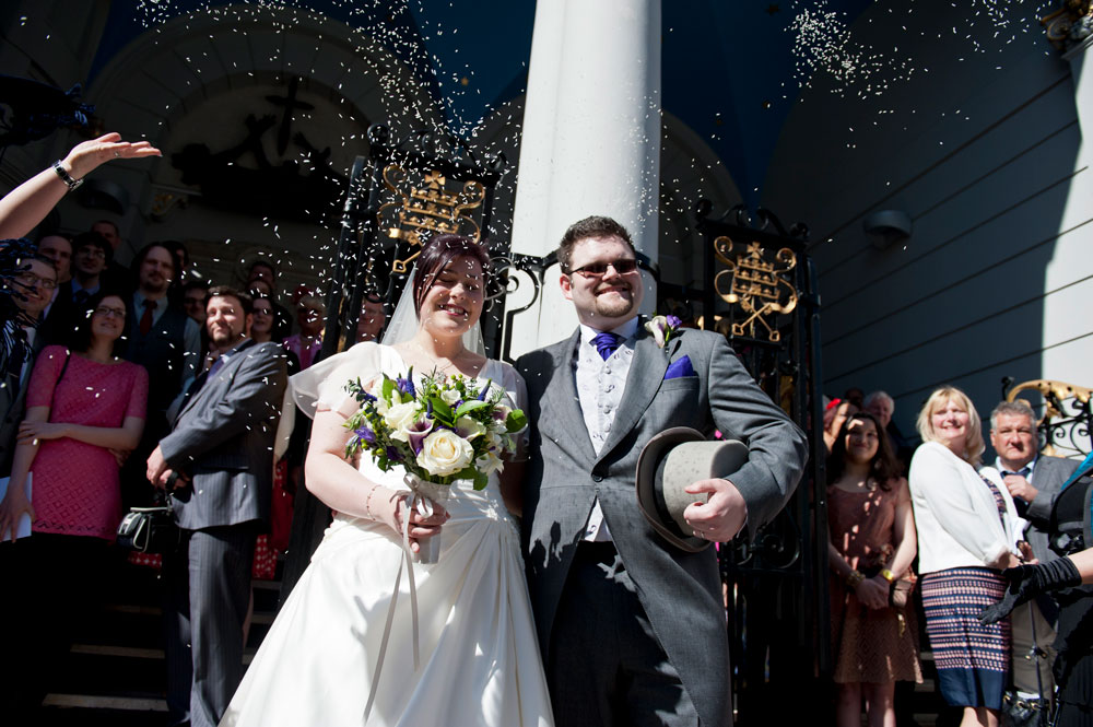 Confetti shot as couple leave church
