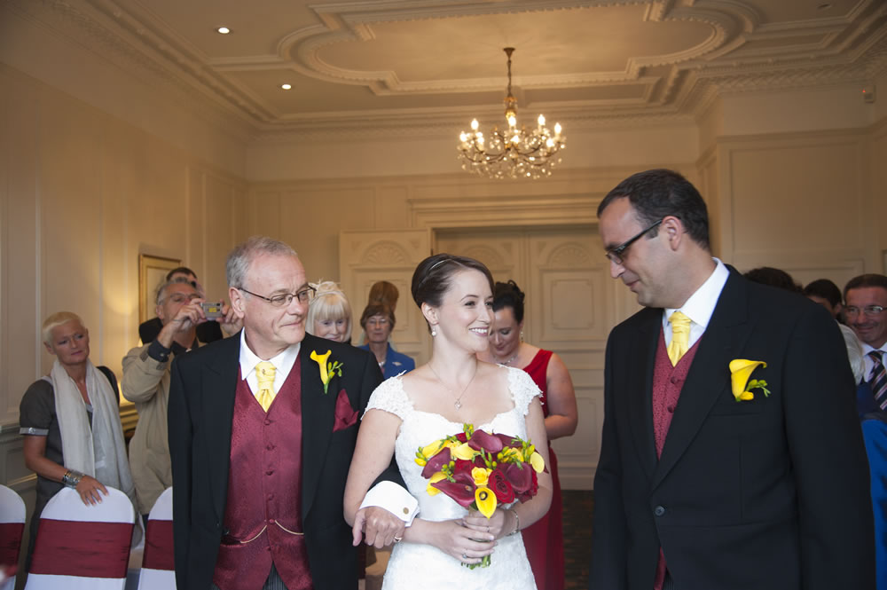 Bride arriving at the altar with her father
