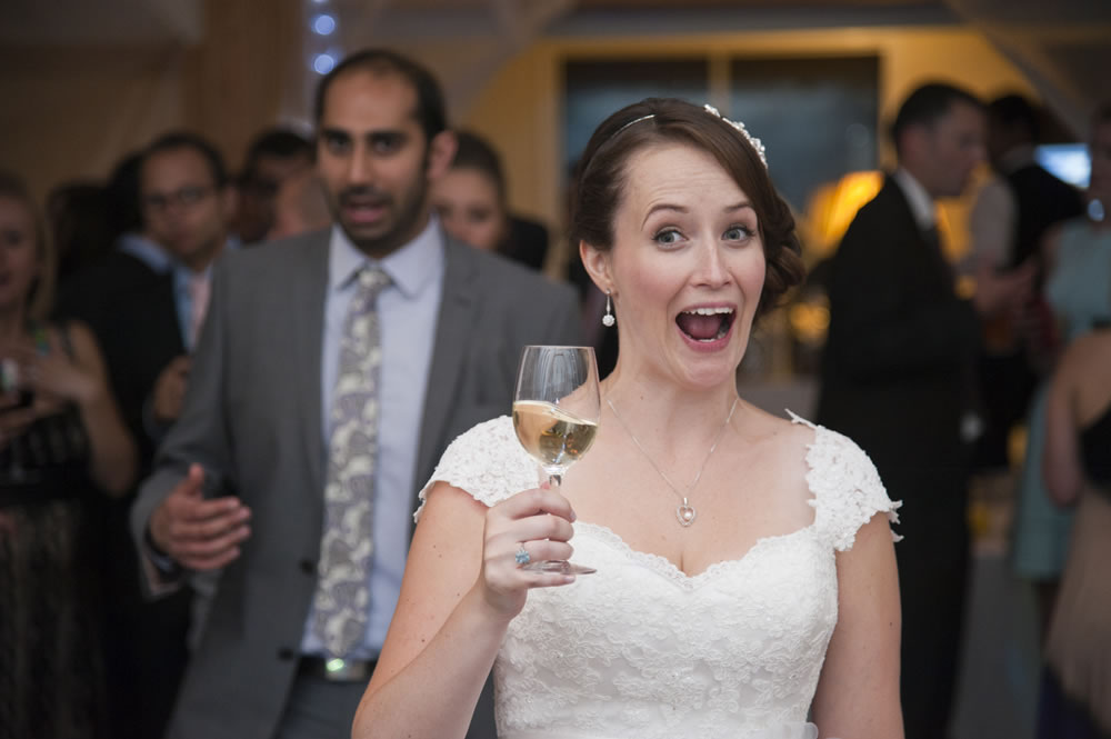 Bride holding a wine glass