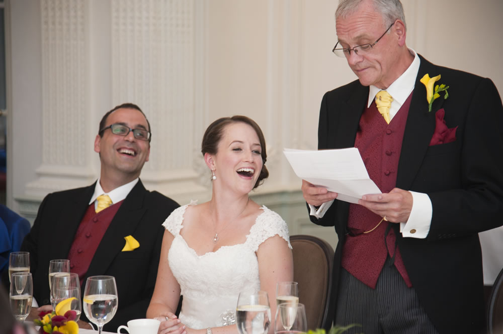 Bride looking at father&rsquo;s speech