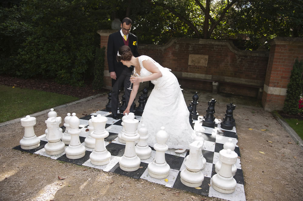 Bride moving large chess piece