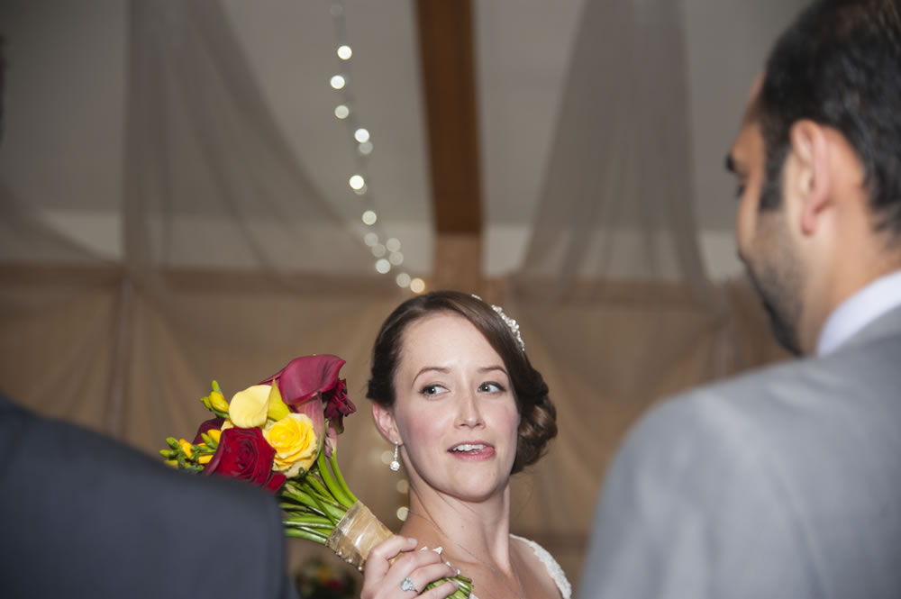 Bride pretending to toss bouquest
