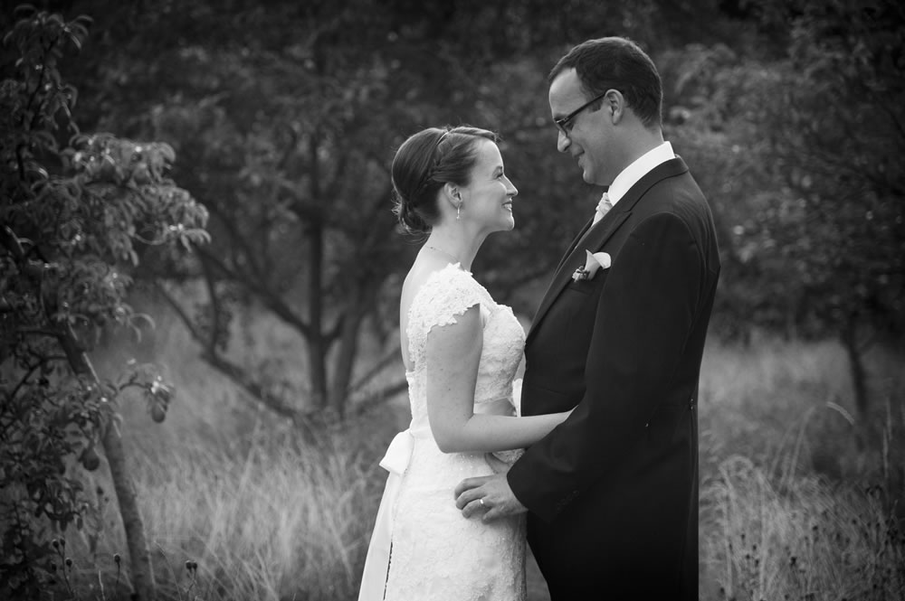 Couple facing each other during their portraits