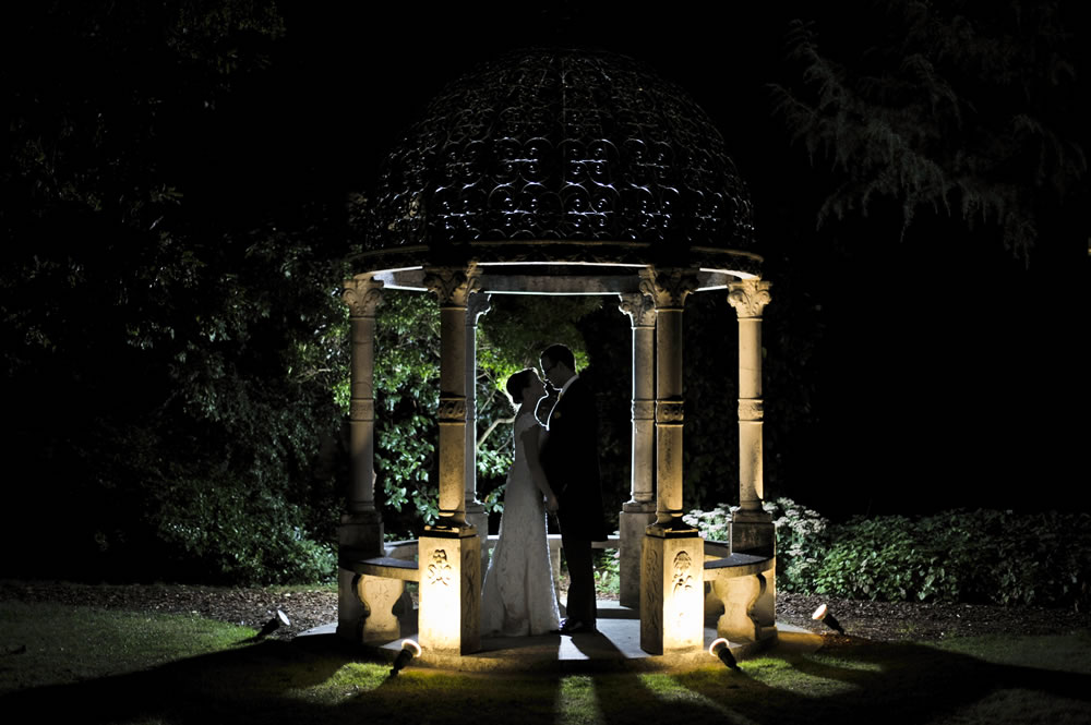 Couple under the gazebo at night